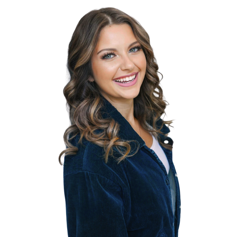Ashley Rannikko, smiling in navy blazer, Director of Marketing & Communications at SBS.