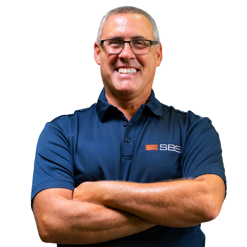 Mike Masciadrelli, smiling with arms crossed, in SBS company polo.