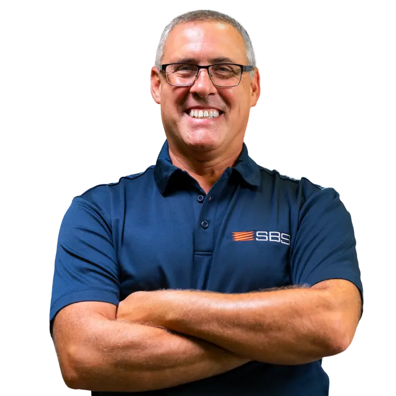 Mike Masciadrelli, smiling with arms crossed, in SBS company polo.